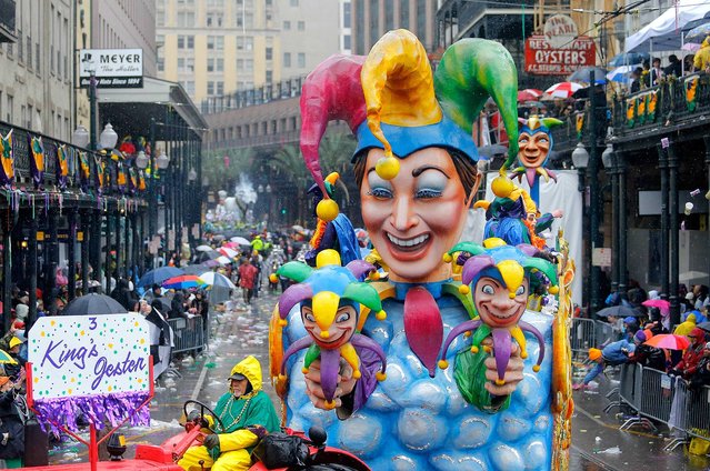 The King's Jester float makes its way toward the Canal Street turn on during a Mardi Gras parade, Tuesday, March 4, 2014, in New Orleans. (Photo by David Grunfeld/AP Photo/NOLA.com/The Times-Picayune)