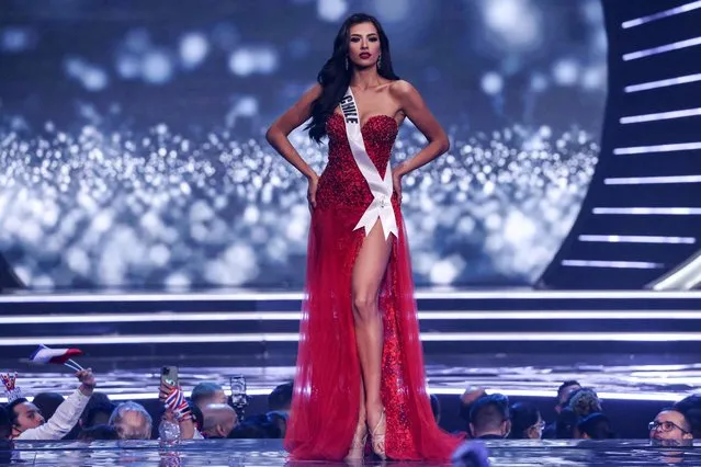 Miss Chile, Antonia Figueroa, presents herself on stage during the preliminary stage of the 70th Miss Universe beauty pageant in Israel's southern Red Sea coastal city of Eilat on December 10, 2021. (Photo by Menahem Kahana/AFP Photo)