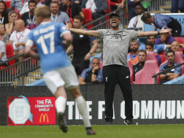Liverpool's manager Jurgen Klopp reacts to his players during the Community Shield soccer match between Manchester City and Liverpool at Wembley Stadium in London, Sunday, August 4, 2019. (Photo by Frank Augstein/AP Photo)