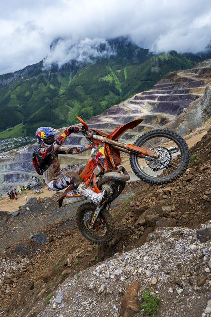 Manuel Lettenbichler performs in the Red Bull Erzberg Rodeo in Eisenerz, Austria on June 2, 2024. The 26-year-old Bavarian began riding at the age of five when his father bought him his first motorbike. At 16 he became the youngest rider to finish the world-renowned Erzberg Rodeo. (Photo by Joerg Mitter/Limex Images)