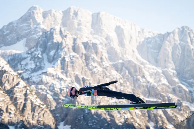 Germany’s Karl Geiger competes during the qualification round of the FIS Ski Jumping World Cup Men Flying Hill Individual competition in Planica, Slovenia on March 24, 2022. (Photo by Jure Makovec/AFP Photo)