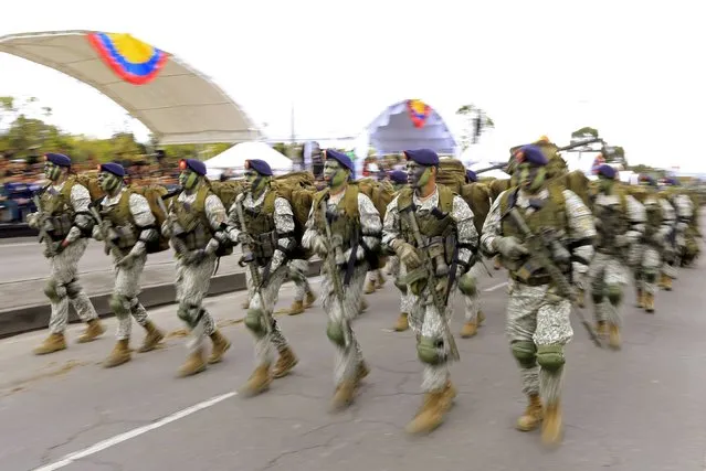 Soldiers participate in Colombia's Independence Day Parade in Bogota, Colombia July 20, 2015. Colombia commemorated the 205th anniversary of its independence from Spain on Monday. (Photo by Jose Miguel Gomez/Reuters)