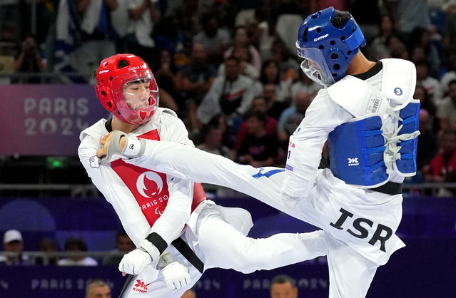 Xiang Wen Xiao of Taiwan in action against Asaf Yasur of Israel during the men's k44 58kg taekwondo semifinal in Paris, France on August 29, 2024. (Photo by Maja Smiejkowska/Reuters)