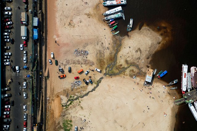 A drone view shows the dry banks of Rio Negro during a drought in the centre of Manaus in the Amazonas state, Brazil, on September 16, 2024. (Photo by Jorge Silva/Reuters)