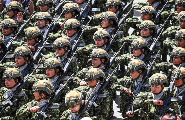 Women members of the Colombian Army take part in a military parade during celebrations for Independence Day in Bogota on July 20, 2023. (Photo by Juan Barreto/AFP Photo)