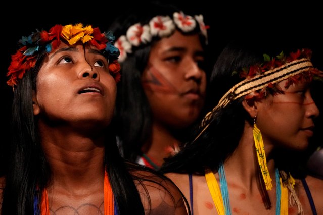 Tembe Indigenous youths perform a ritual dance at the start of a ceremony presenting Brazil's national Indigenous census at Theater da Paz for a in Belem, Brazil, August 7, 2023. The two-day Amazon Summit opens Tuesday, Aug. 8, 2023, in Belem, where Brazil hosts policymakers and others to discuss how to tackle the immense challenges of protecting the Amazon and stemming the worst of climate change. (Photo by Eraldo Peres/AP Photo)