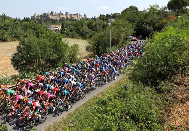 Competitors are seen during the 16th stage of the Tour de France cycling race, which covers  178.5 kilometers, with the start in Carcassonne and the finish in Foix, France on July 19, 2022. (Photo by Gonzalo Fuentes/Reuters)