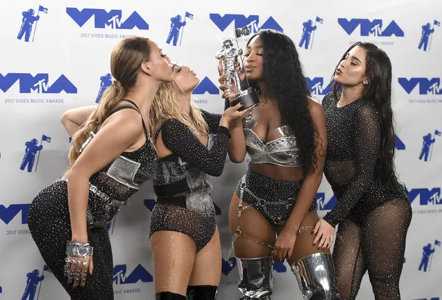 Dinah Jane, from left, Ally Brooke, Normani Kordei, and Lauren Jauregui of Fifth Harmony pose in the press room with the award for best pop video for “Down” at the MTV Video Music Awards at The Forum on Sunday, August 27, 2017, in Inglewood, Calif. (Photo by Jordan Strauss/Invision/AP Photo)
