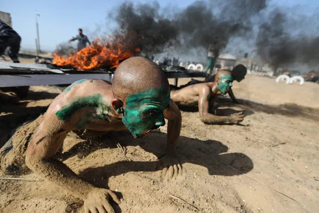Palestinian police cadets take part in a training session at a police academy in Khan Yunis, in the southern Gaza Strip on February 6, 2020. (Photo by Mahmud Hams/AFP Photo)