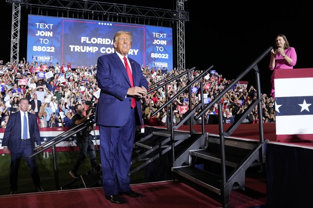 Former President Donald Trump arrives to speak at a campaign rally in Hialeah, Fla., Wednesday, November 8, 2023. Arkansas Gov. Sarah Huckabee Sanders, stands right. (Photo by Lynne Sladky/AP Photo)