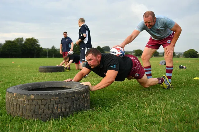 Member of Old Plymouthian and Mannameadians Rugby Club train together in a large group for the first time since lockdown at King George V playing fields on August 13, 2020 in Plymouth, England. Stage C of the return to play Rugby Protocol is now in operation as coronavirus restrictions are eased. (Photo by Dan Mullan/Getty Images)
