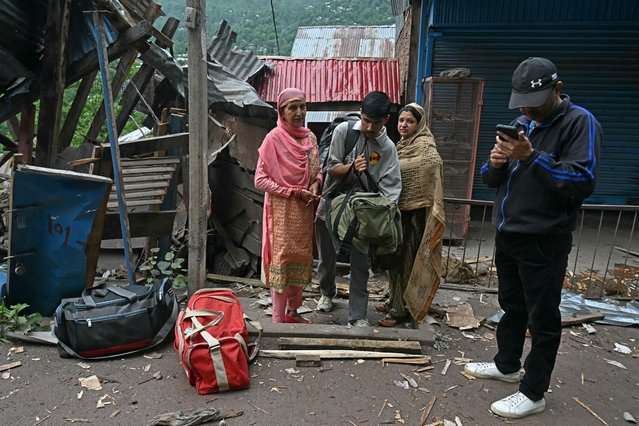 Local residents prepare to evacuate after Pakistani artillery shelling at the Lagama village in Uri, about 100kms from Srinagar, on May 9, 2025. India and Pakistan accused each other on May 8 of carrying out waves of drone attacks, as deadly confrontations between the nuclear-armed foes drew global calls for calm. (Photo by Tauseef Mustafa/AFP Photo)
