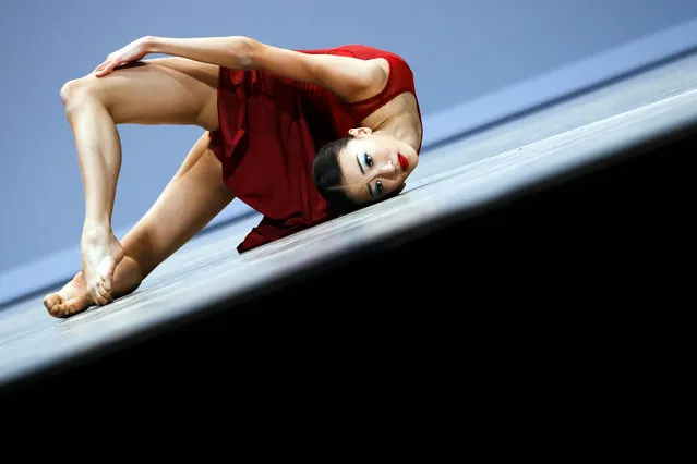 Irene Yang from Canada performs her contemporary variation during the final of the 46th Prix de Lausanne in Lausanne, Switzerland, Saturday, February 3, 2018. Launched in 1973, the Prix de Lausanne is an international dance competition for young dancers aged 15 to 18. Closing the six-day event, prizes are awarded to the best of 21 finalists consisting of scholarships granting free tuition in a world-renowned dance school or dance company. (Photo by Valentin Flauraud/Keystone via AP Photo)