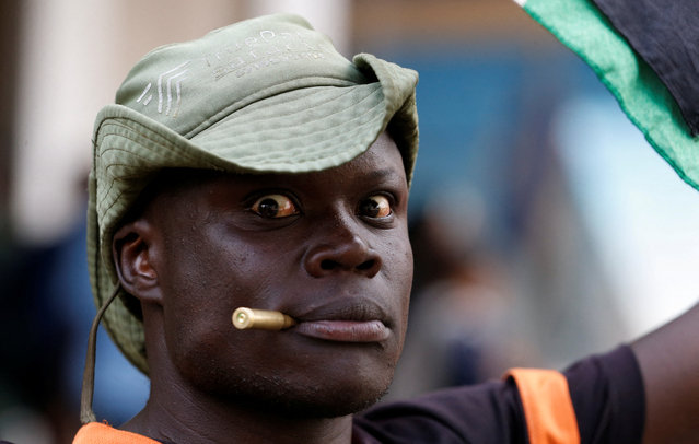A protester looks on with an empty bullet shell during a demonstration against the death of a blogger in police custody last week, in downtown Nairobi, Kenya on June 12, 2025. (Photo by Thomas Mukoya/Reuters)
