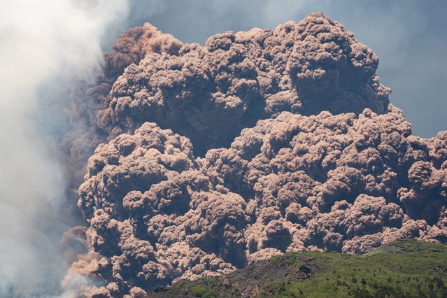 Plumes of ash and volcanic steam rise from Mount Etna, as seen from Milo, Italy on June 2, 2025. (Photo by Marco Restivo/Reuters)