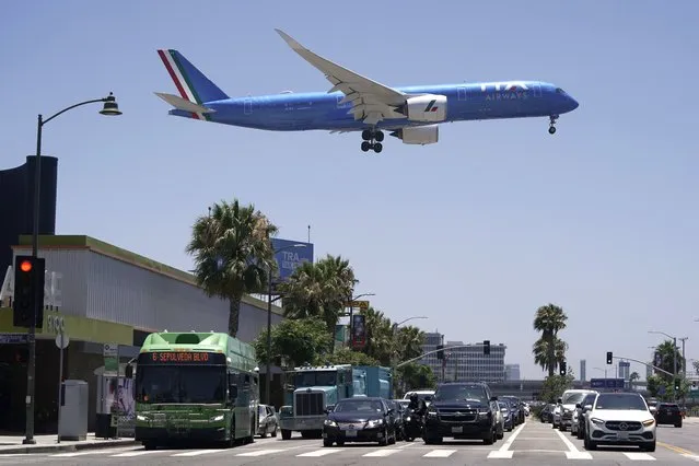 An ITA Airways passenger jet approaches to land at the Los Angeles International Airport in Los Angeles, on July 1, 2022. German airline Lufthansa said it submitted an offer Wednesday Jan. 18, 2023 to take a minority stake in Italy’s ITA Airways Spa, formerly Alitalia. (Photo by Jae C. Hong/AP Photo)