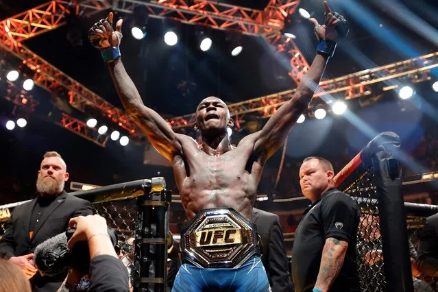 Israel Adesanya of Nigeria celebrates after knocking out Alex Pereira of Brazil in round 2 to reclaim the middleweight title during UFC 287 at Kaseya Center on April 08, 2023 in Miami, Florida. (Photo by Carmen Mandato/Getty Images via AFP Photo)
