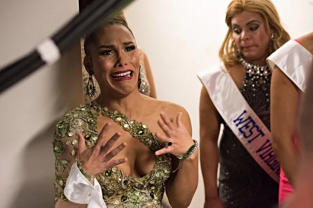 Gadfrie Arbulu (Washington DC) practices her reaction, should she be crowned the winner at the TransNation Festival's 15th Annual Queen USA Transgender Beauty Pageant at The Theatre at Ace Hotel on October 22, 2016 in Los Angeles, California. (Photo by Melissa Lyttle/The Guardian)
