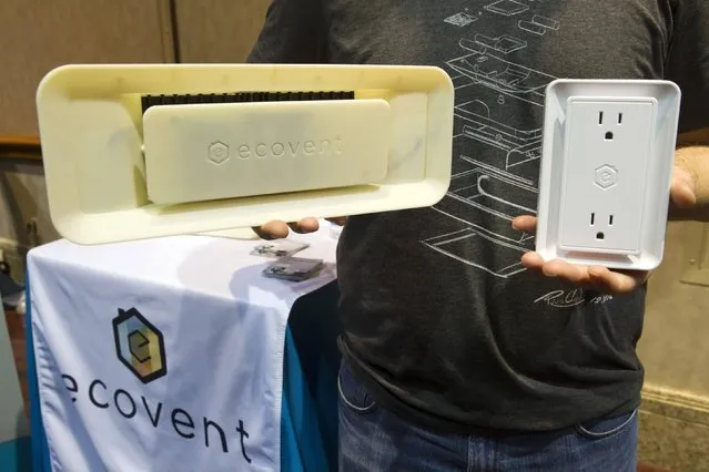 An Ecovent and sensor are displayed during the 2015 International Consumer Electronics Show (CES) in Las Vegas, Nevada January 4, 2015. The system, about $1,800 for a four-bedroom home, can automatically open or close vents for the perfect temperature in a home with central heating and cooling. The system should be available in August of 2015, a representative said. (Photo by Steve Marcus/Reuters)