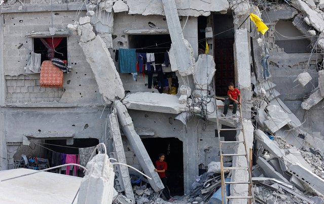 Palestinian children amid the rubble of destroyed buildings, during a ceasefire between Israel and Hamas, in Jabalia, northern Gaza Strip, on November 4, 2025. (Photo by Mahmoud Issa/Reuters)