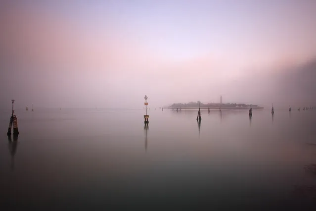 “Venice”. One of the out lying island in Venice shrouded in early morning fog. It was incredibly calm and serene. (Photo and caption by Brian Yen/National Geographic Traveler Photo Contest)
