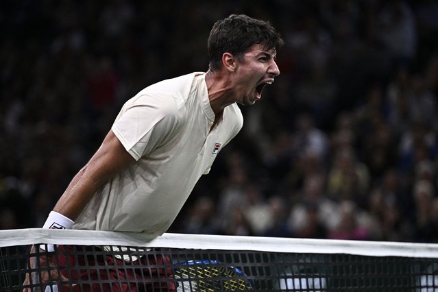 Australia's Alexei Popyrin celebrates after a point as he plays against Russia's Daniil Medvedev during their men's singles match on day three of the Paris ATP Masters 1000 tennis tournament at the Accor Arena - Palais Omnisports de Paris-Bercy – in Paris on October 30, 2024. (Photo by Julien de Rosa/AFP Photo)