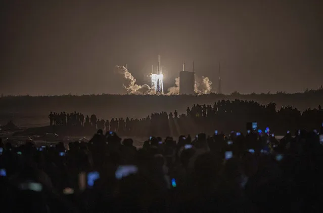 A Long March-5 rocket carrying Chang'e-5 spacecraft blasts off from Wenchang Spacecraft Launch Site on November 24, 2020 in Wenchang, Hainan Province of China. China launches Chang'e-5 spacecraft to collect and return samples from the moon (Photo by Liu Yang/VCG via Getty Images)