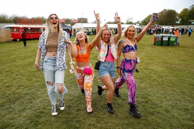 Women react during a test music festival as part of a national research programme assessing the risk of COVID-19 transmission in Liverpool, Britain on May 2, 2021. (Photo by Jason Cairnduff/Reuters)