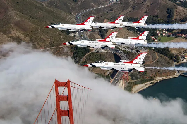 The Air Force Air Demonstration Squadron Thunderbirds Delta flies over the Golden Gate Bridge. The Thunderbirds were returning from the California Capital City Air Show to Nellis Air Force Base. (Photo by U.S. Air Force by Staff Sgt. Ashley Corkins)