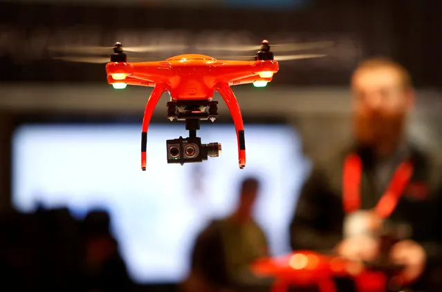 An Autel Robotics X-Star drone with a FLIR Duo module is shown during the 2017 CES in Las Vegas, Nevada, U.S., January 6, 2017. The module is a compact dual-sensor thermal and visible light imager. (Photo by Steve Marcus/Reuters)