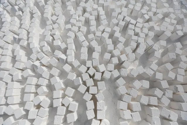 In this Wednesday, March 18, 2015 photo, freshly cut limestone bricks are arranged and ready for transport at a quarry in the desert of Minya, southern Egypt. (Photo by Mosa'ab Elshamy/AP Photo)