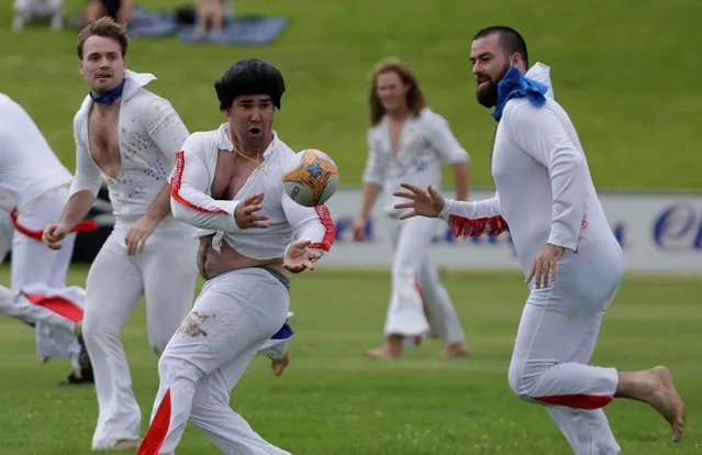 Amateur rugby players wear Elvis suits as they play a game between the Blue Suede Shoes and Reddy Teddies during the 25th annual Parkes Elvis Festival in the rural Australian town of Parkes, west of Sydney, Australia January 13, 2017. (Photo by Jason Reed/Reuters)