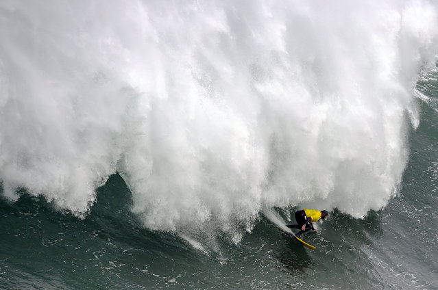 A big waves' surfer competes during the Illa Pancha Challenge surfing competition in Ribadeo, northern Spain, on January 29, 2019. (Photo by Miguel Riopa/AFP Photo)