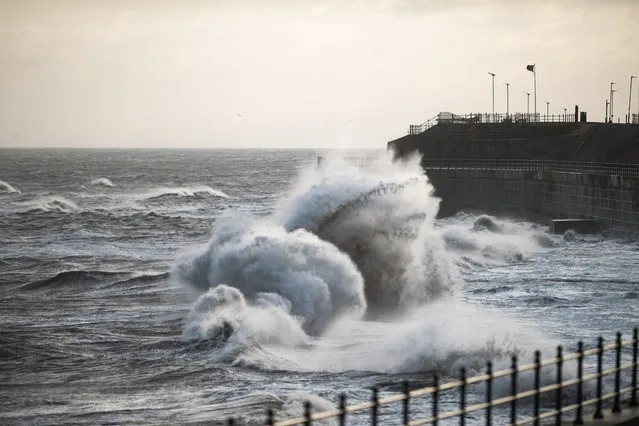 Waves crash against the Headland Promenade in Hartlepool, northeast England in the second decade of December 2023, as strong winds from Storm Pia battered the UK. (Photo by Jordan Crosby/The Times)