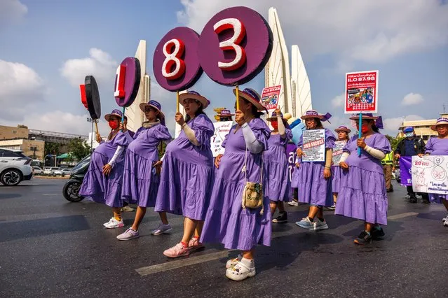 Women dressed in pregnancy costumes march to Government House on International Women's Day to draw attention to maternity issues on March 08, 2024 in Bangkok, Thailand. Members of Thai labor unions and women's networks march from Democracy Monument to Government House calling for women workers rights and maternity rights on International Women's Day. The demonstration aimed to highlight the duration of maternity leave for women in Thailand, currently set at only 8 days. Women's groups are calling upon the government to extend maternity leave to 120 days. (Photo by Lauren DeCicca/Getty Images)