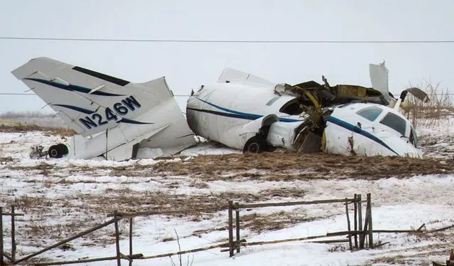 The wreckage of an airplane lies in a field Tuesday, March 29, 2016, in Havre-aux-Maison, Quebec. The crashed Tuesday off an island in eastern Quebec killed several people, Quebec provincial police said. Among those killed was former federal cabinet minister and political commentator Jean Lapierre. (Photo by David Noel/The Canadian Press via AP Photo)