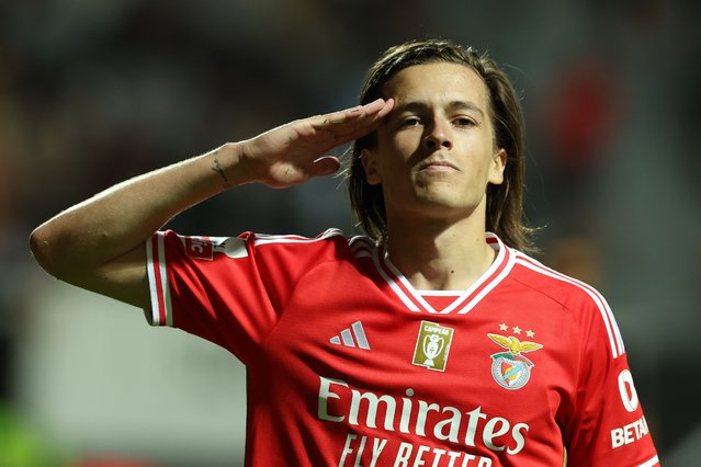 Alvaro Carreras of Benfica celebrates after scoring the 1-3 goal during the Portuguese First League soccer match between Farense and Benfica, in Faro, Portugal, 22 April 2024. (Photo by Luis Branca/EPA)