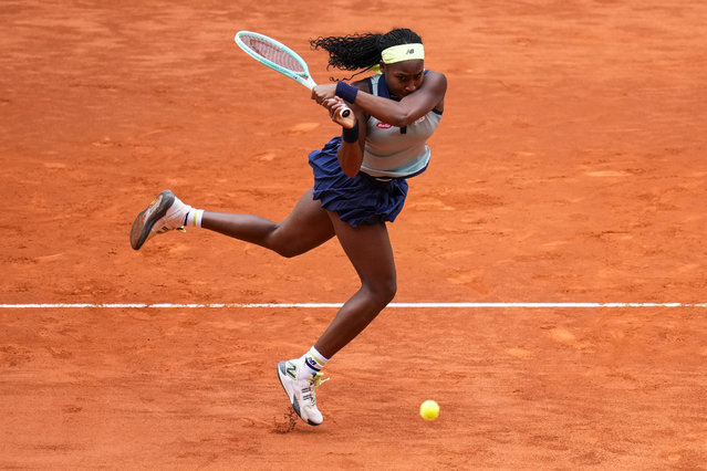 Coco Gauff of the United States returns the ball to Arantxa Rus of Netherlands during the Mutua Madrid Open tennis tournament in Madrid, Thursday, April 25, 2024. (Photo by Manu Fernandez/AP Photo)