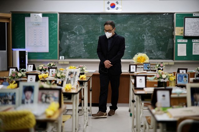 A man takes a look around a replicated classroom of students who died in the sunken Sewol ferry disaster that killed 304 people, mostly school students, in Ansan, South Korea, on April 16, 2024. (Photo by Kim Hong-Ji/Reuters)