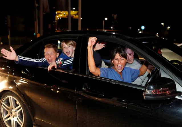 Leicester City fans celebrate outside the King Power stadium after their team won the Premier League title in Leicester, Britain May 2, 2016. (Photo by Eddie Keogh/Reuters)