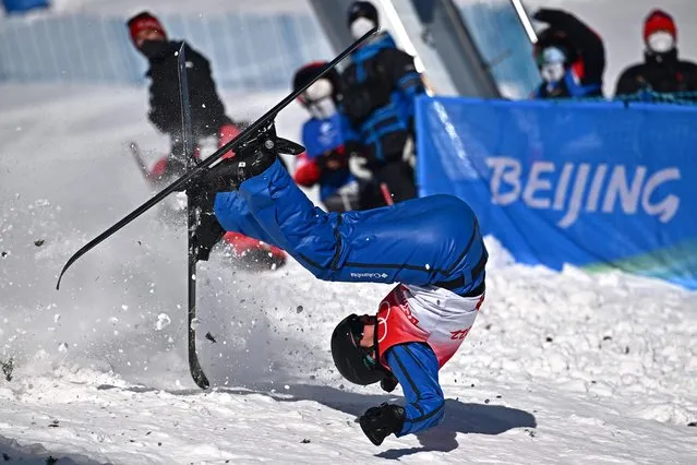 Ukraine's Olga Polyuk falls while competing in the freestyle skiing women's aerials qualification during the Beijing 2022 Winter Olympic Games at the Genting Snow Park A & M Stadium in Zhangjiakou on February 14, 2022. (Photo by Marco Bertorello/AFP Photo)