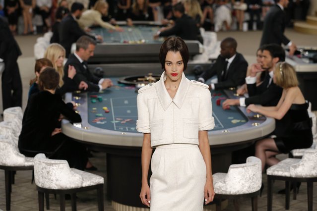 A model presents a creation by German designer Karl Lagerfeld as part of his Haute Couture Fall Winter 2015/2016 fashion show for French fashion house Chanel at the Grand Palais which is transformed into a casino in Paris, France, July 7, 2015. (Photo by Stephane Mahe/Reuters)