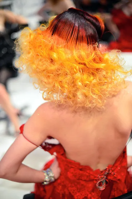 A Model styled by a participant waits to be judged by the jury during the contest “Day style” of the OMC Hairworld World Cup on May 4, 2014 in Frankfurt am Main, Germany. (Photo by Thomas Lohnes/Getty Images)