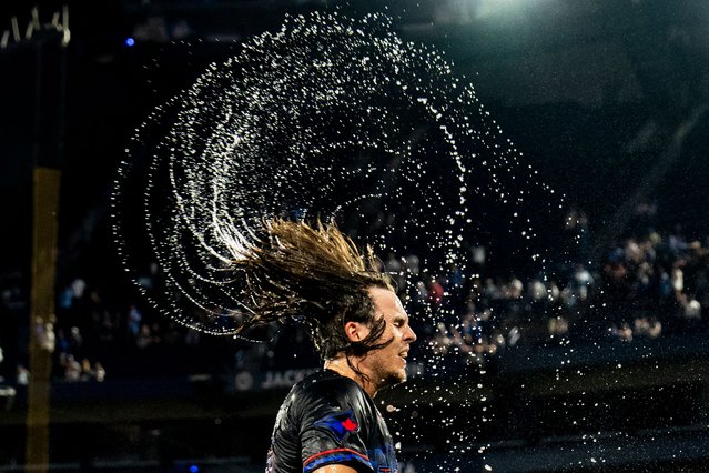 Addison Barger #47 of the Toronto Blue Jays shakes off water after defeating the Los Angeles Angels at Rogers Centre on August 23, 2024 in Toronto, Canada. (Photo by Kevin Sousa/Getty Images/AFP Photo)