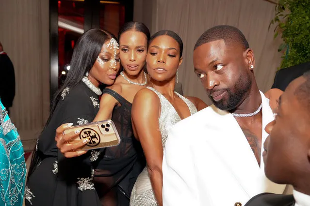 (L-R) Naomi Campbell, Kerry Washington, Gabrielle Union, and Dwyane Wade attend The 2022 Met Gala Celebrating “In America: An Anthology of Fashion” at The Metropolitan Museum of Art on May 02, 2022 in New York City. (Photo by Kevin Mazur/MG22/Getty Images for The Met Museum/Vogue)