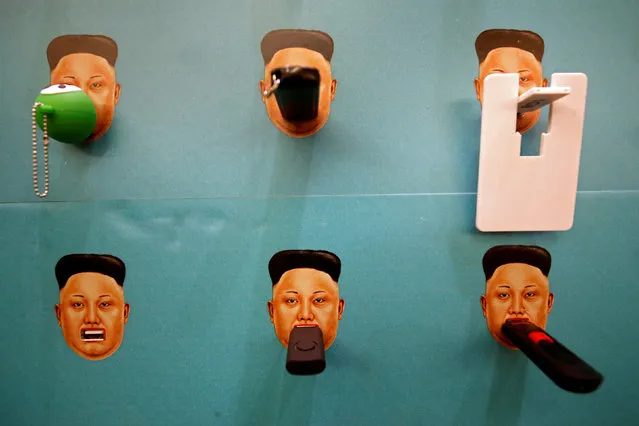 Donated flash drives are shown with images of North Korean leader Kim Jong-un on Human Rights Foundation's “Flash Drives for Freedom” wall during the Def Con hacker convention in Las Vegas, Nevada, U.S. on July 29, 2017. The group uses the donated flash drives to smuggle outside information into North Korea, a representative said. (Photo by Steve Marcus/Reuters)