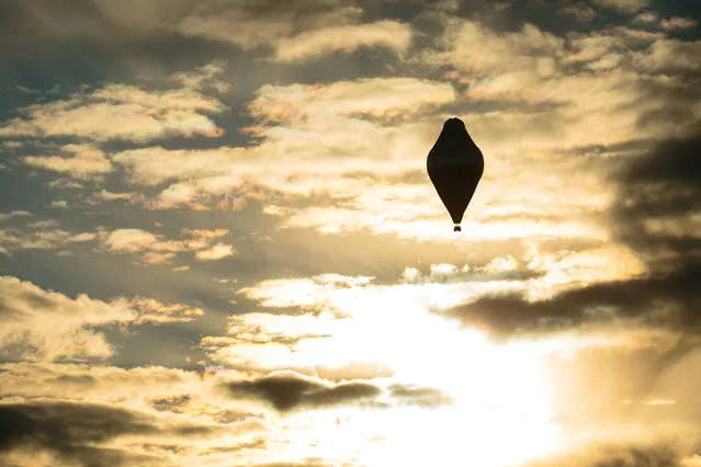 The balloon of Russian adventurer Fedor Konyukhov is seen after it lifted off in his attempt to break the world record for a solo hot-air balloon flight around the globe near Perth, Australia, in this handout image received July 12, 2016. (Photo by Oscar Konyukhov/Reuters)