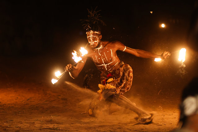 Sections of the ceremonies of the Serer, Fula, and Mandinka peoples are showcased, with songs performed and accompanied by traditional dances during the promotional night of the Dakar Carnival, which takes place in the baobab forest in Mbour, Senegal, on November 27, 2024. The carnival, now in its 5th year, held its pre-carnival preparations in the village of Mbourokh, located near the city of Mbour, approximately 100 kilometers from the capital, Dakar. (Photo by Cem Ozdel/Anadolu via Getty Images)
