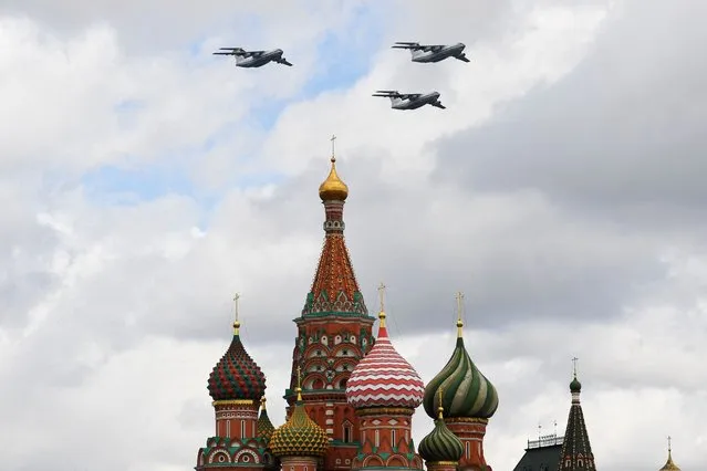 Russian Ilyushin Il-76md military transport aircrafts fly over Red Square in Moscow during a rehearsal for the WWII Victory Parade on May 4, 2022. Russia will celebrate the 77th anniversary of the 1945 victory over Nazi Germany on May 9. (Photo by Natalia Kolesnikova/AFP Photo)