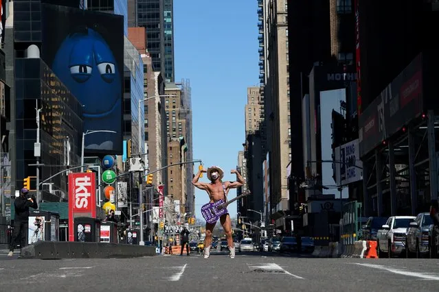Naked Cowboy Still Singing in Times Square (With Face Mask 